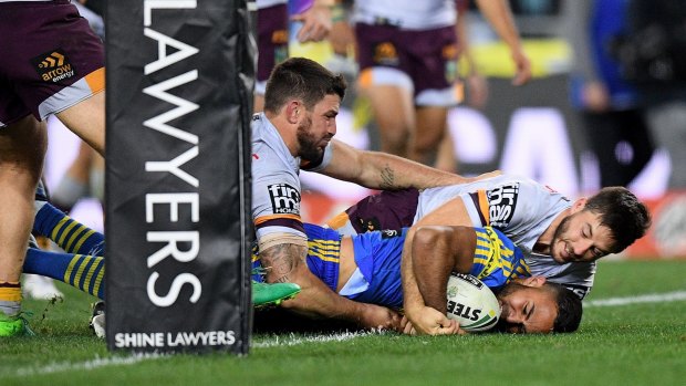 The closer: Young Eels fullback Bevan French scores late against the Broncos.