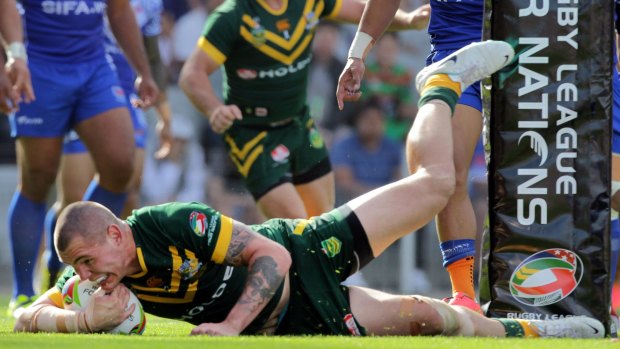 Future force: Young gun David Klemmer crashes over for a try against Samoa.