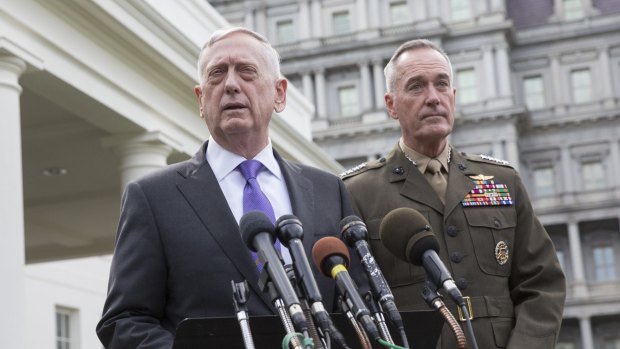 James Mattis (left) speaks as General Joseph Dunford, chairman of the US Joint Chiefs of Staff, listens during a news conference regarding the situation in North Korea.