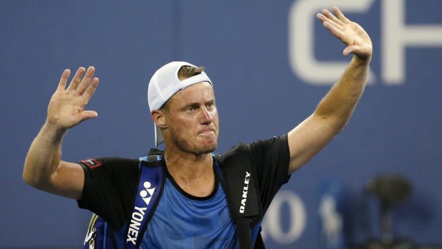 That's all folks: Lleyton Hewitt bids farewell to the crowd after losing to countryman Bernard Tomic at the US Open.