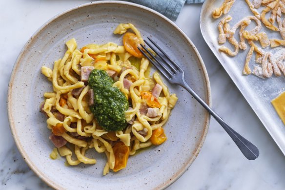 Giovanni Pilu's pasta twists tossed though a tomato sauce with tuna cubes and finished with a dollop of cheese-free pesto.