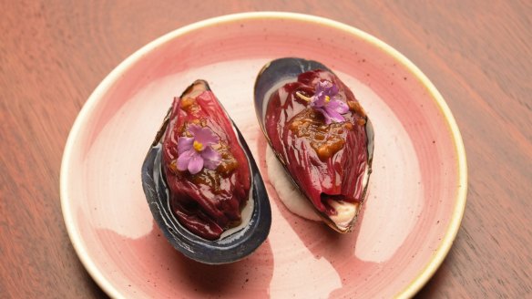 Mussels with XO and aioli, draped in radicchio.