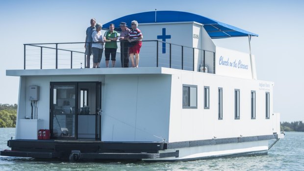 Reverend Lyn Bullard and companions on the Church on the Clarence River. 