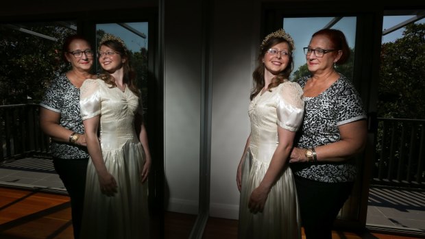 Maruschka Loupis helps daughter Yasmine try on the dress she wore at her wedding in 1978, and that her mother Judy wore in 1944.