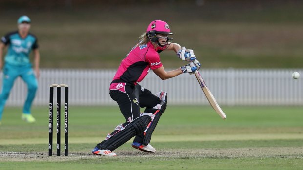 Composed: Ellyse Perry guides the ball during her controlled knock at Drummoyne Oval