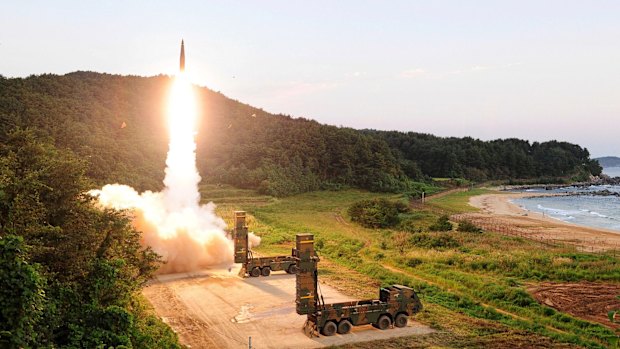 A Hyunmoo II ballistic missile is fired during an exercise at an undisclosed location in South Korea part of a live-fire exercise simulating an attack on North Korea's nuclear test site.