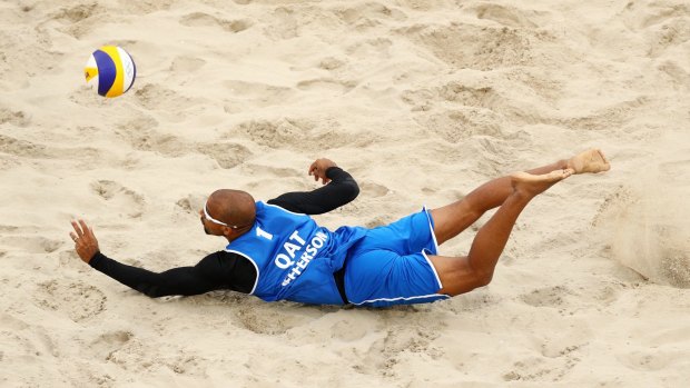 Playing for Qatar in his home country: Jefferson Santos Pereira dives for the ball against Austria in Rio on Wednesday.