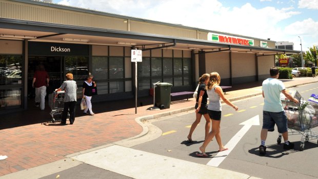 Police say the two boys, aged 16 and 17, went looking for the severely autistic boy outside Dickson Woolworths on Sunday night. 