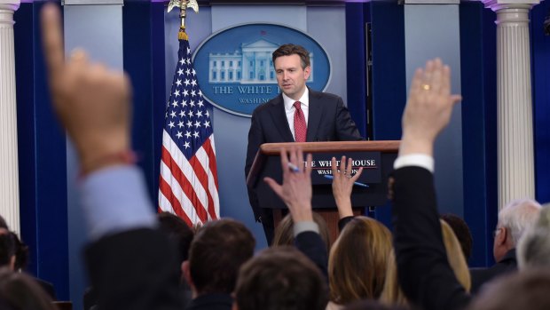 White House press secretary Josh Earnest speaks during the daily briefing at the White House in Washington on January 13.