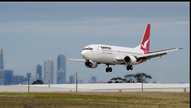 A Qantas flight lands in Melbourne. 