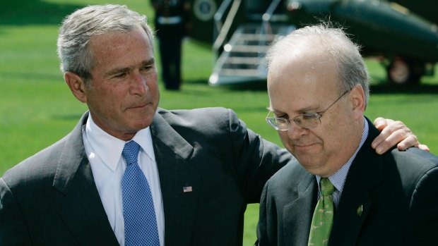 Former US president George Bush with adviser Karl Rove.