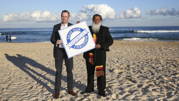 MLC David Shoebridge and Waverley councillor Dominic Wy Kanak on Bondi beach.
