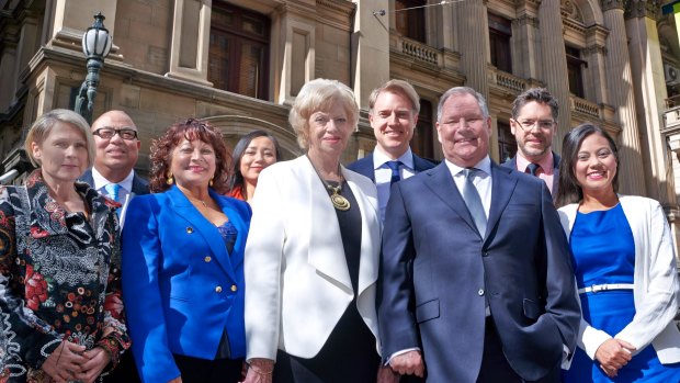 Team Doyle lining up outside Town Hall (from left) Sue Stanley, Kevin Louey, Beverley Pinder-Mortimer, Hope Wei, Susan Riley, Arron Wood, Nicholas Reece and Tessa Sullivan.