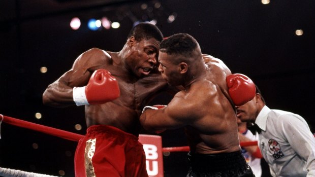 Frank Bruno in action against then world heavyweight champion Mike Tyson in 1989. 