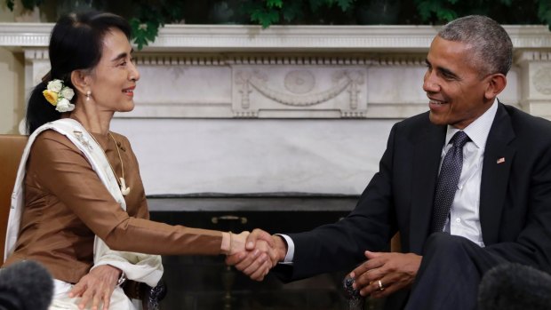 Myanmar's Foreign Minister Aung San Suu Kyi shake hands with US President Barack Obama in the Oval Office last week, after the US lifted sanctions on her country.