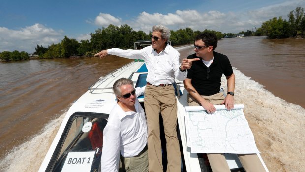 John Kerry, centre, with David Thorne, left, now his senior adviser, and Dartmouth College associate professor of history Edward Miller on the Mekong Delta.