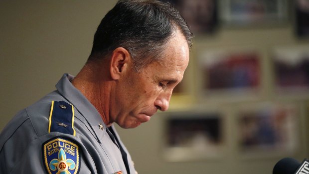 Baton Rouge police chief Carl Dabadie Jr faces the media after the shooting.