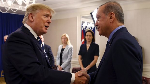 Donald Trump and Recep Tayyip Erdogan, right, shake hands prior to their meeting in New York, last month.