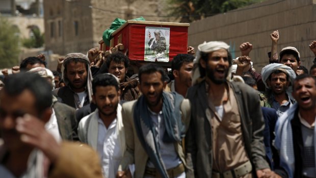 Shiite rebels, known as Houthis, carry the coffin of a fellow Houthi who was killed during fighting against  Saudi-backed Yemeni forces in Marib province in May.