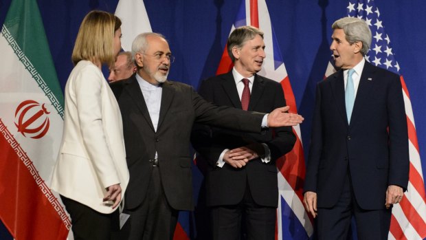 EU High Representative for Foreign Affairs Federica Mogherini, Iranian Foreign Minister Mohammad Javad Zarif, British Foreign Secretary Philip Hammond and US Secretary of State John Kerry line up for a press announcement in Lausanne, Switzerland, on April 2.