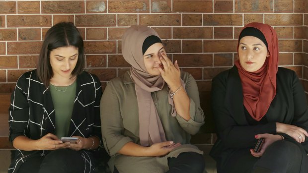(From left to right)  Nour, Ola and Amani Haydar outside the NSW Supreme Court where their father Haydar Haydar is standing trial, charged with the murder of their mother Salwa.