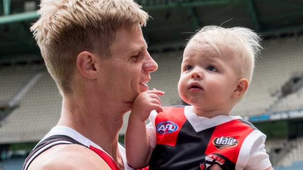 Milestone: St. Kilda captain Nick Reiwoldt, with son James, will play his 300th game on Saturday. 