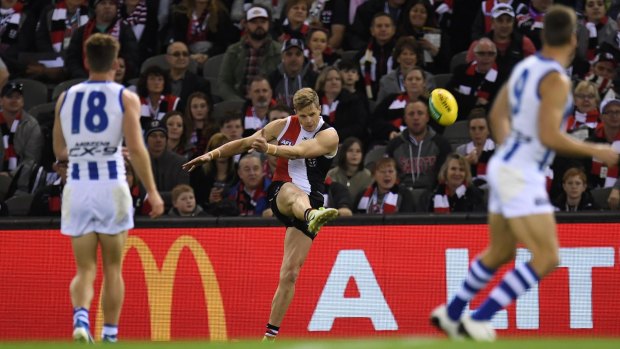 Going out in style: Nick Riewoldt sends one long for the Saints at Etihad.