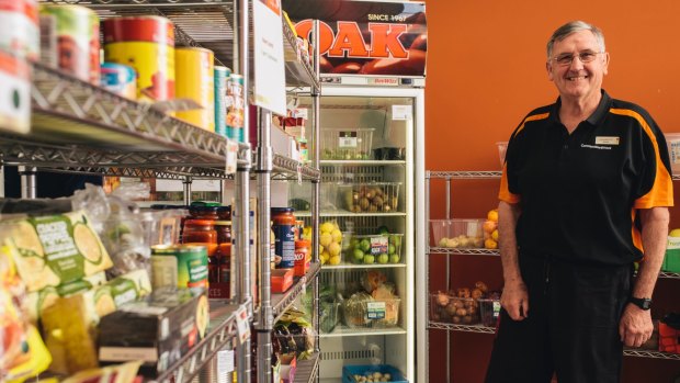 Communities at work volunteer Graeme Matthew at the Pantry he helps run for disadvantaged Canberrans.