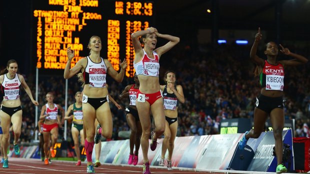 Faith Kibiegon of Kenya (R) wins the women's 1500m ahead of Laura Weightman of England (C) and Kate van Buskirk of Canada.