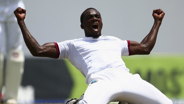 Under bowled: Jerome Taylor of West Indies celebrates after taking the wicket of Steve Smith and collecting career-best figures.