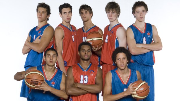 Part of a former AIS basketball squad, including Patty Mills, front centre, and Matthew Dellavedova, back right.