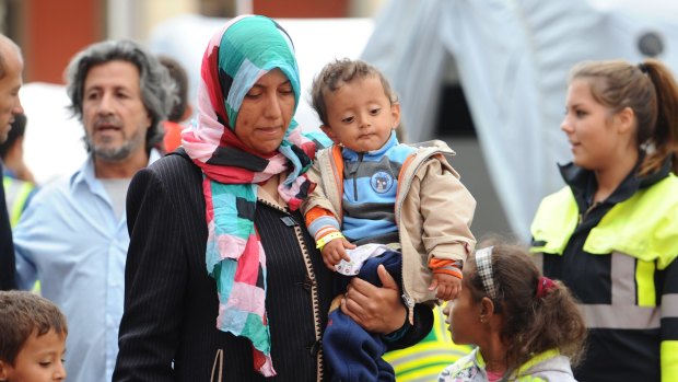 Refugees transfer trains in Munich, Germany.