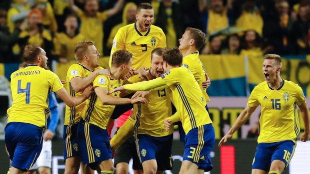 Sweden's Jakob Johansson celebrates after scoring against Italy.