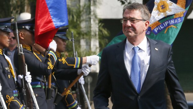 US Defence Secretary Ash Carter reviews troops at the closing ceremony of the 11-day joint US-Philippines military exercise dubbed "Balikatan 2016" (Shoulder-To-Shoulder 2016) last week. 