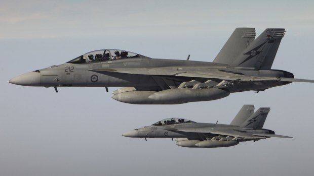 RAAF F/A-18F Super Hornets return after completing a combat mission over Iraq. 