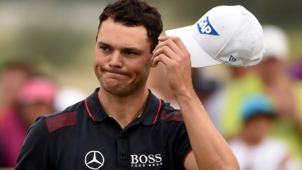 Oh dear: German golfer Martin Kaymer scratches his head after surrendering a 10-shot lead on the final day at the Abu Dhabi HSBC Championship.