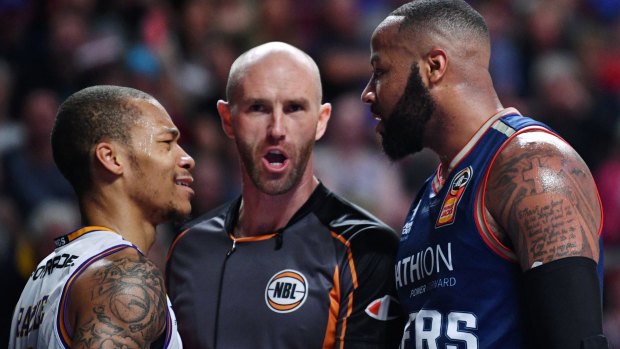 Heated: Jeremy Randle of the Sydney Kings and Shannon Shorter exchange words.