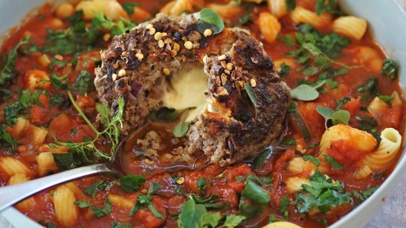 Minestrone with cheese-stuffed meatball. 