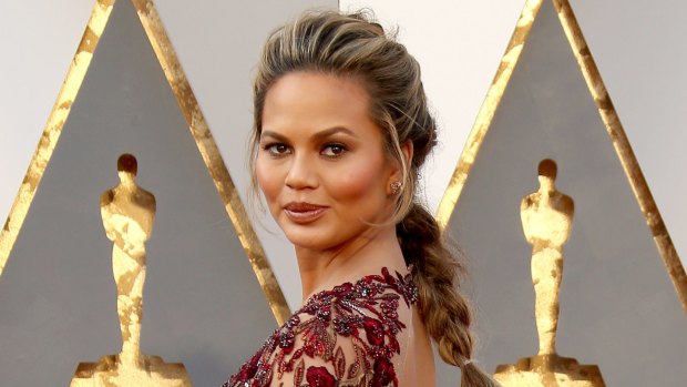 Chrissy Teigen attends the 88th Annual Academy Awards earlier this year.