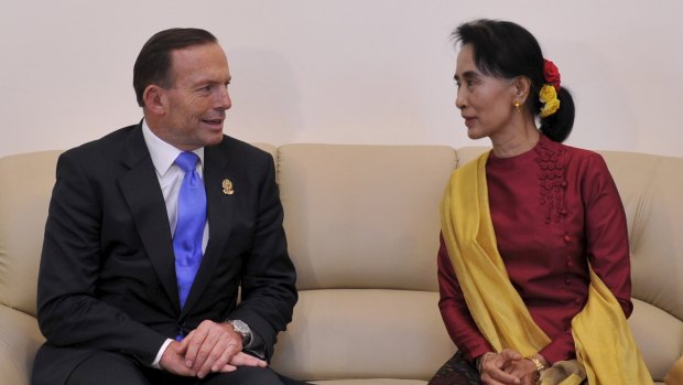 Tony Abbott meets with 
Aung San Suu Kyi.