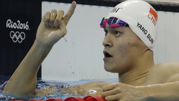 Won gold: Sun Yang celebrates.