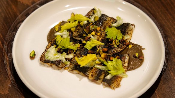 Sardines with olive puree, celery and pistachio.