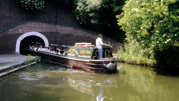Barges at the Dudley Black Country Museum in England allow visitors to explore rock formations, limestone mines, branch tunnels and canal basins.