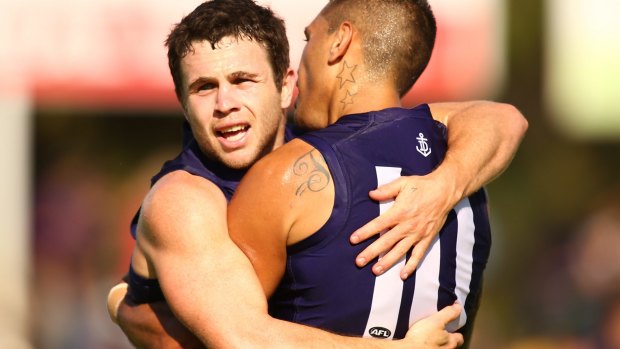 Hayden Ballantyne with teammate Michael Walters before he was forced to leave the field due to a minor hamstring injury.