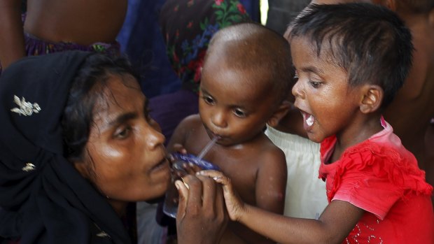 A Rohingya family who arrived by boat in Indonesia's Aceh Province. 