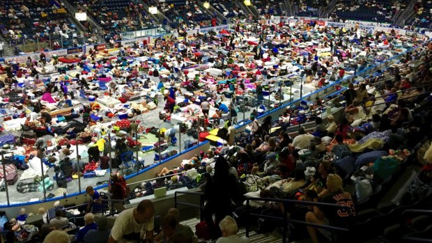 Evacuees fill Germain Arena, which is being used as a fallout shelter, in advance of Hurricane Irma, in Estero, Florida.