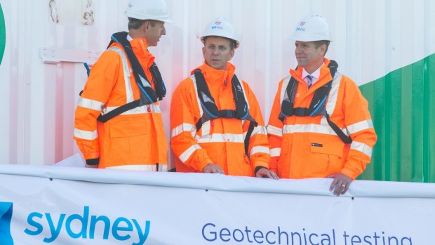 Sydney Metro project director Rodd Staples, left, with Mr Constance and Mr Baird on the Geotech barge.
