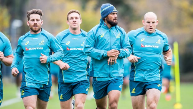 In the team: Karmichael Hunt (second from right) will make his Test debut against Fiji on Saturday.