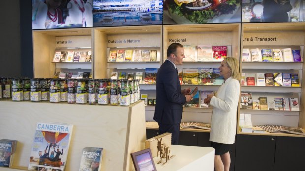 ACT Chief Minister Andrew Barr and the Federal Minister for Local Government and Territories, Fiona Nash, inside the new Canberra and Region Visitors Centre. 