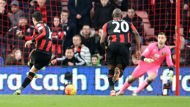That will do nicely: Bournemouth's Charlie Daniels scores from the penalty spot against Norwich City at The Vitality Stadium.